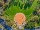 Aerial view of a baseball field with seating and surrounding parking at 216 21St Ne Ave, St Petersburg, FL 33704