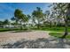 Park with lush greenery, walking path, and a bench, offering a relaxing outdoor space at 216 21St Ne Ave, St Petersburg, FL 33704