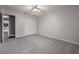 Spacious bedroom with grey carpet and ceiling fan at 2291 Bolzano Ct, Land O Lakes, FL 34639