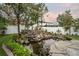 Relaxing pond and waterfall in backyard at 2291 Bolzano Ct, Land O Lakes, FL 34639