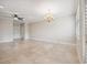 Bright dining room with tile floors and a chandelier at 2648 Tanglewood Trl, Palm Harbor, FL 34685