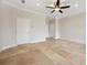 Living room with tile floors and a door leading outside at 2648 Tanglewood Trl, Palm Harbor, FL 34685