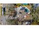 Aerial view showcasing home, pool, and surrounding landscape at 2735 Park N St, St Petersburg, FL 33710