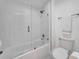 Clean bathroom with a shower/tub combo and glass enclosure at 2735 Park N St, St Petersburg, FL 33710