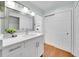 Bright bathroom with white cabinets and quartz countertop at 2735 Park N St, St Petersburg, FL 33710