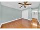 Bedroom with hardwood floors, ceiling fan and ensuite bathroom at 2735 Park N St, St Petersburg, FL 33710