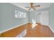 Bright bedroom with hardwood floors, ceiling fan and closet at 2735 Park N St, St Petersburg, FL 33710