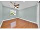 Bedroom with hardwood floors and a ceiling fan at 2735 Park N St, St Petersburg, FL 33710