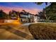 Two-story house at night with a curved driveway at 2735 Park N St, St Petersburg, FL 33710