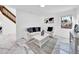 Relaxing living room with white sofas, a coffee table and a view of the staircase at 2735 Park N St, St Petersburg, FL 33710