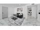 Open living area with marble floors and a view into another room at 2735 Park N St, St Petersburg, FL 33710