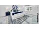 Spacious main bedroom with a king-size bed and built-in storage at 2735 Park N St, St Petersburg, FL 33710