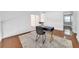 Home office with hardwood floors and built-in desk at 2735 Park N St, St Petersburg, FL 33710