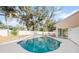 Refreshing kidney-shaped pool in backyard at 2735 Park N St, St Petersburg, FL 33710