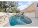 Relaxing kidney-shaped pool with deck at 2735 Park N St, St Petersburg, FL 33710