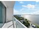 Relaxing balcony with glass railings offering stunning water and city views at 2910 W Barcelona St # 2102, Tampa, FL 33629