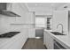 Sleek kitchen with stainless steel appliances and white cabinetry at 2910 W Barcelona St # 2102, Tampa, FL 33629