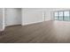 Bright living room with hardwood floors and water views at 2910 W Barcelona St # 2102, Tampa, FL 33629