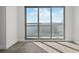 Living room featuring hardwood floors and sliding glass doors to balcony at 2910 W Barcelona St # 2102, Tampa, FL 33629