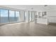 Bright living room with hardwood floors and water views at 2910 W Barcelona St # 2102, Tampa, FL 33629