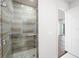 Modern bathroom with glass shower and wood vanity at 2910 W Barcelona St # Ph-2302, Tampa, FL 33629