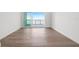 Spacious bedroom with hardwood floors and water views at 2910 W Barcelona St # Ph-2302, Tampa, FL 33629