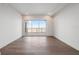 Bright bedroom with hardwood floors and access to balcony with water views at 2910 W Barcelona St # Ph-2302, Tampa, FL 33629