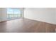 Spacious bedroom with hardwood floors and access to a private balcony at 2910 W Barcelona St # Ph-2302, Tampa, FL 33629