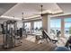 Fitness center with modern equipment and water views at 2910 W Barcelona St # Ph-2302, Tampa, FL 33629