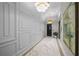 Elegant hallway with marble floors and classic wall paneling at 2910 W Barcelona St # Ph-2302, Tampa, FL 33629