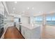 Modern open kitchen with ocean views and hardwood floors at 2910 W Barcelona St # Ph-2302, Tampa, FL 33629