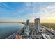 Wide aerial view of cityscape, waterfront, and construction at 2910 W Barcelona St # Ph-2303, Tampa, FL 33629