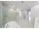 Spa-like bathroom with walk-in shower and freestanding tub at 2910 W Barcelona St # Ph-2303, Tampa, FL 33629