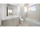 Modern bathroom with a single vanity and a bathtub at 2910 W Barcelona St # Ph-2303, Tampa, FL 33629