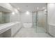 Luxurious bathroom with soaking tub, double vanity, and glass shower at 2910 W Barcelona St # Ph-2303, Tampa, FL 33629