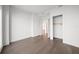 Empty bedroom with hardwood floors and closet at 2910 W Barcelona St # Ph-2303, Tampa, FL 33629