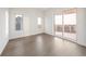 Bright bedroom with hardwood floors and sliding glass door to balcony at 2910 W Barcelona St # Ph-2303, Tampa, FL 33629