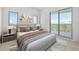 Spacious bedroom with city views and private balcony access at 2910 W Barcelona St # Ph-2303, Tampa, FL 33629