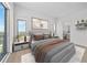 Bright bedroom with large windows offering stunning city views at 2910 W Barcelona St # Ph-2303, Tampa, FL 33629