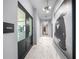 Modern hallway leading to fitness center and lounge at 2910 W Barcelona St # Ph-2303, Tampa, FL 33629