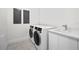 Convenient laundry room with side-by-side washer and dryer at 2910 W Barcelona St # Ph-2303, Tampa, FL 33629