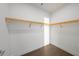 Spacious walk-in closet with wood shelving at 2910 W Barcelona St # Ph-2303, Tampa, FL 33629