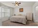 Spacious bedroom with carpeted floor and ceiling fan at 3304 Suncoast Plains Dr, Odessa, FL 33556