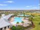 Resort-style pool with lounge chairs and cabanas at 3304 Suncoast Plains Dr, Odessa, FL 33556