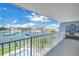 Balcony overlooking the marina and pool area at 340 Pinellas Bayway S # 306, St Petersburg, FL 33715