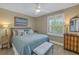 Bedroom with coastal decor and ensuite bath at 340 Pinellas Bayway S # 306, St Petersburg, FL 33715