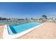 Refreshing community pool overlooking the marina at 340 Pinellas Bayway S # 306, Tierra Verde, FL 33715