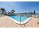 Inviting community pool with ample deck space for lounging at 340 Pinellas Bayway S # 306, St Petersburg, FL 33715