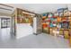 Storage area with pegboard and shelving for organization at 340 Pinellas Bayway S # 306, St Petersburg, FL 33715