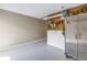 Spacious garage with an epoxy floor and storage cabinet at 340 Pinellas Bayway S # 306, Tierra Verde, FL 33715